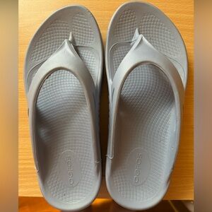 Oofos slip-on flip flops, women’s size 8, light blue, only worn 5 times.